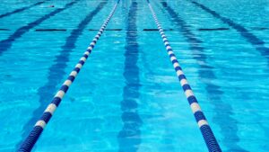Broken Bow Cosmos Swim Team Competes at Kearney - Callie White Qualifies for Midwestern Championships