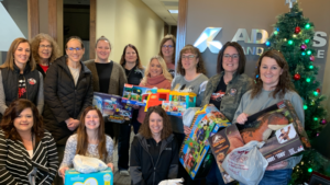 Adams Land & Cattle Employees Donate Beef and Over 320 Gifts to Local Families