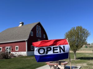 Opening day for Byway's Red Barn: windmill on, quilts up