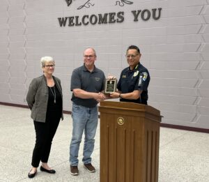 Council honors Captain Hanson's 40 years, boosts Spirit Softball at final May meeting