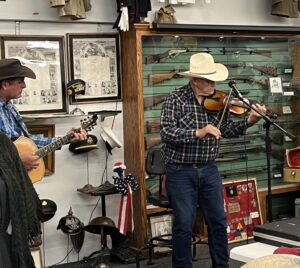 Museum social draws a dozen pies, 60 people, and a pair of folk heroes