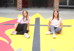 Sisters Use Talents to Give Back