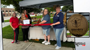 DebbieDee's Bakery cuts ribbon with Broken Bow Chamber