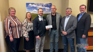 Gateway Motors presents Melham Medical Center with $3,000 check