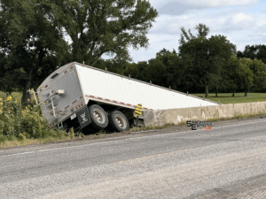 Trailer detaches, takes dive into creek on Highway 2 near Broken Bow