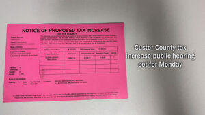 Custer County Residents Receive Pink Postcards: Invitation to Public Meeting on Tax Increase