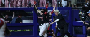 Kuszak walks off Arkansas in 10th inning of women's college world series opener