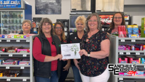 Downtown Trotter's Whoa & Go presented GROW award, celebrates 25 year anniversary and renovation