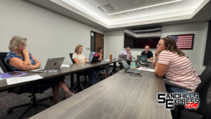 School board approves $750,000 settlement over fraudulent payment
