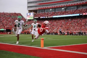 Huskers Fight Past Hawks