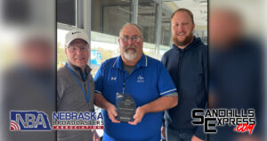 Larry Cotnoir surprised with Nebraska Broadcasters Association Career Achievement Award